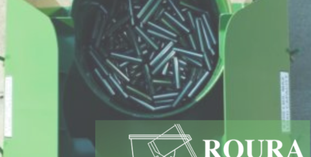 A rotator box holding a barrel filled with steel rods